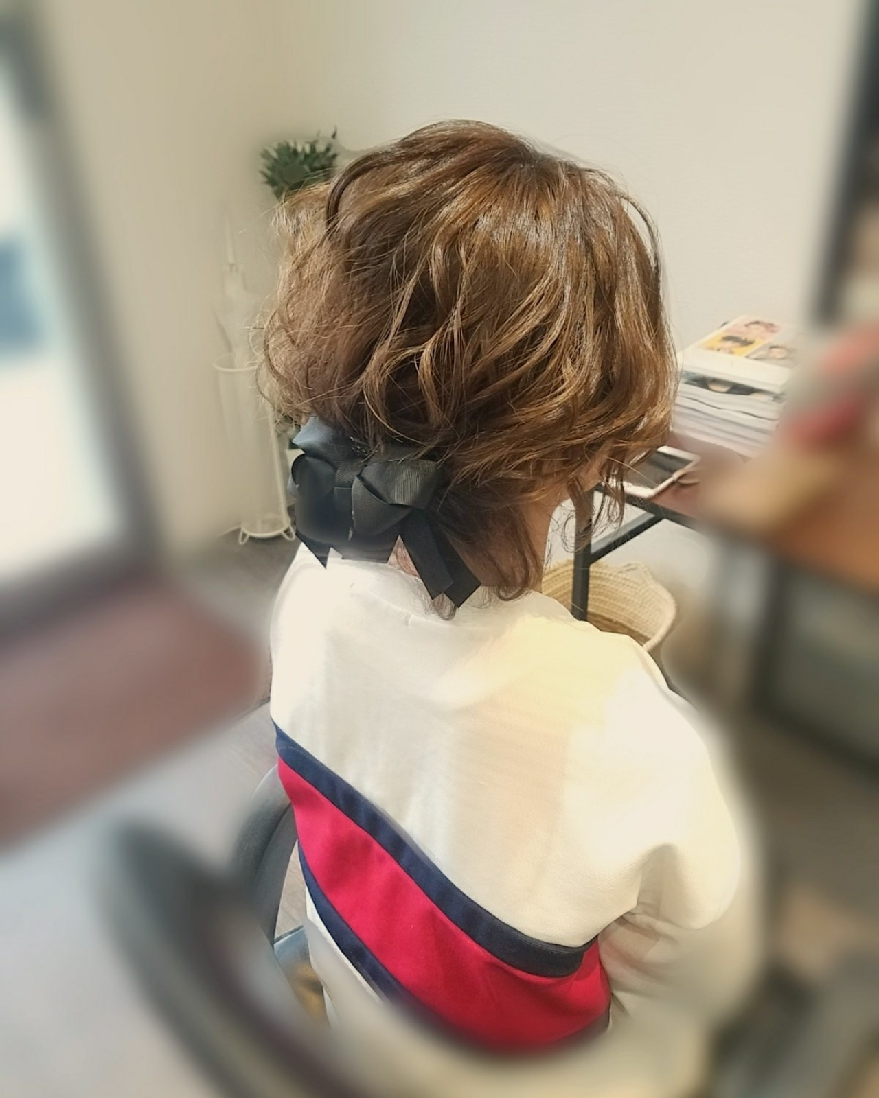 バックに動きを持たせたアップスタイル mai